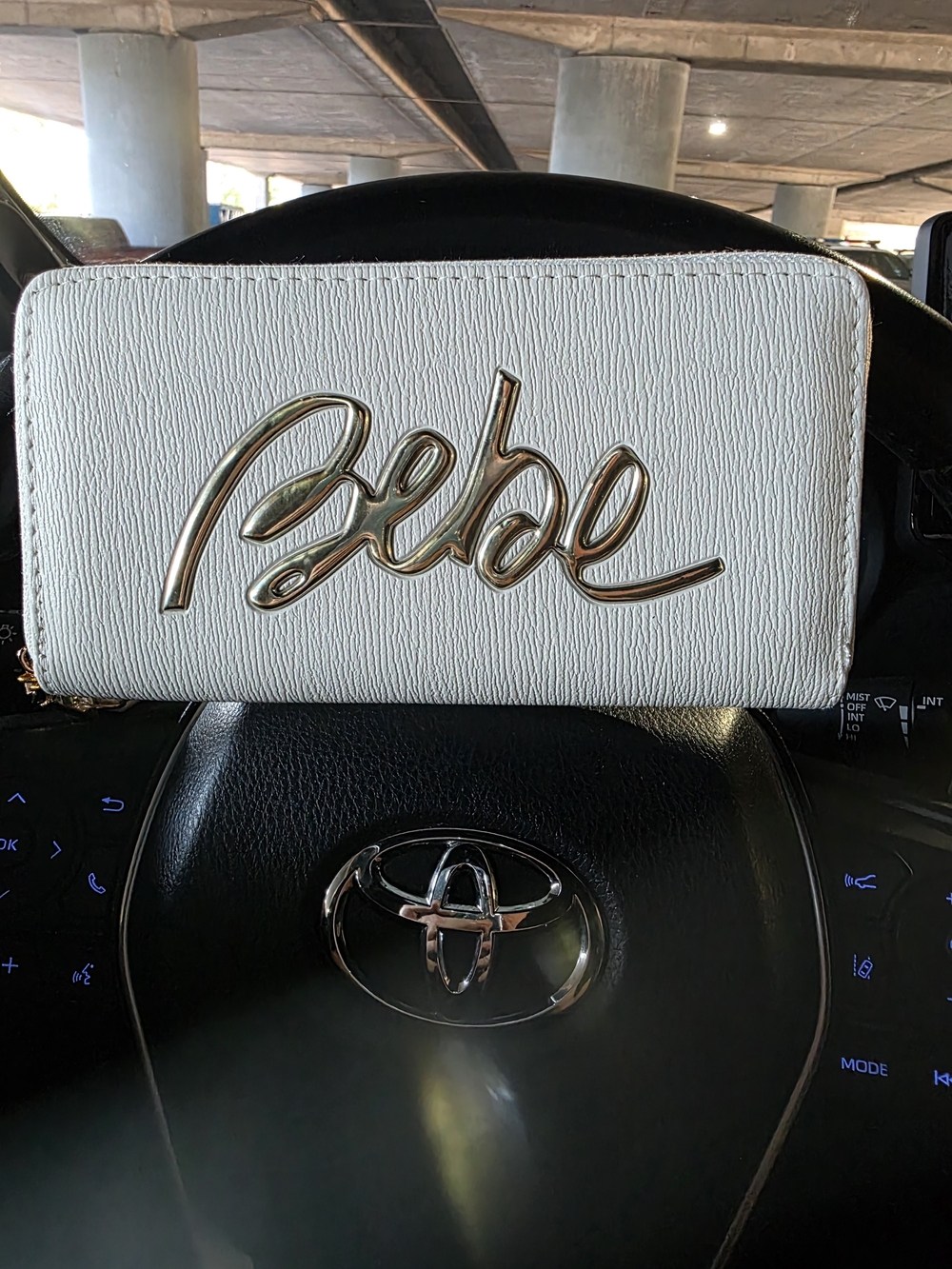 bebe White Zip Wallet with Gold Logo
